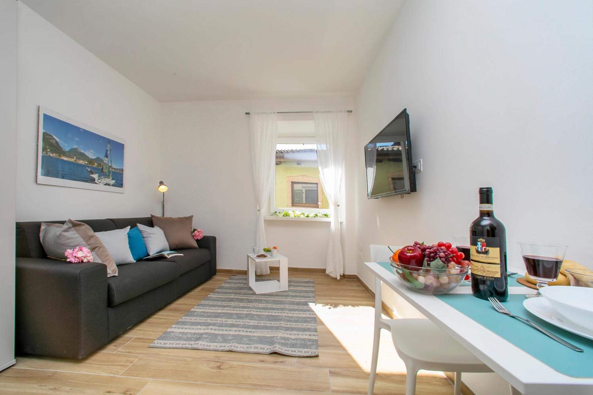 Nido Sui Tetti Di Riva Del Garda - Happy Rentals エクステリア 写真